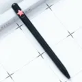 Sleek black ballpoint pen with a cute pink star top design for smooth daily writing gift. - Five-pointed Star / Black