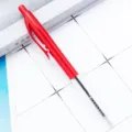 Retractable plastic ballpoint pen with transparent barrel and custom logo printing option. - Red