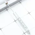 Outdoor multifunctional metal tool pen with scale ruler, portable diy craft tool for daily use. - Silver