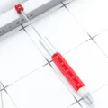 Multi-functional metal tool pen with scale ruler, red and silver design for DIY crafts. - Red