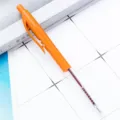 Retractable plastic ballpoint pen with transparent barrel and orange clip for office and school. - Orange