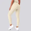 High waist nude feel yoga leggings detail showing elastic fabric and butt lift fit. - S / Bottoms / Light Ivory