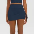 Navy blue athletic yoga skort with side drawstring ruching, comfortable activewear fitness skirt. - S / Bottoms / Abyss Blue