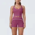 Close-up of contrast piping details on women's athletic crop top and shorts set. - S / Top And Bottom / Fig Purple
