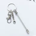 Porte-clés en métal avec mousqueton et pendentif de forme originale pour les sacs. - Plaqué Argent
