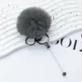 Grey fluffy pom pom keychain with metal ring and pin charm, cute fuzzy bag accessory. - Plated Gunmetal