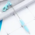 Blue portable mini telescopic keychain pen with cute clip and bead, lightweight tool. - Candy Blue