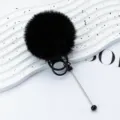 Black fluffy pom pom keychain plush pendant with metal rings and decorative beaded pin. - Black