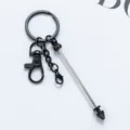 Porte-clés punk DIY en métal noir avec pendentif pointe conique et breloque pour sac élégante. - Noir