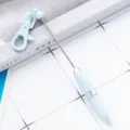 Portable mini keychain pen telescopic creative gift pen for office school use blue color. - Macaron Light Blue