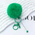 Green fluffy pom-pom keychain with metal ring and pin accessory, perfect cute bag pendant. - Dark Green
