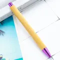 Natural bamboo ballpoint pen with purple metal trim, perfect for eco-friendly office stationery. - Bullet Tip 1.0 / Deep purple