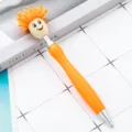 Cute plush doll head ballpoint pen in orange with funny smiley face design for gift. - Orange