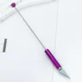 Precisie hobbyknipmes met paarse metalen handgreep voor nauwkeurig snijwerk en papierart. - Donkerpaars