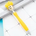 Cute yellow plush doll head ballpoint pen with a smiling face and smooth barrel for gift. - Yellow