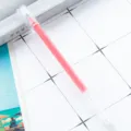 Clear transparent gel pen with bright pink ink, ideal for cute student journaling and drawing. - Red