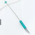 Precisie hobbyknutselmes met turquoise metalen handvat voor papier snijden en knutselen. - Teal