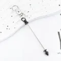 Metal lobster clasp DIY keychain pendant with long conical bullet rod for bag accessories. - Black