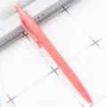 Simple plastic retractable ballpoint pen in light pink, smooth writing office stationery. - Macaron Light Orange Red