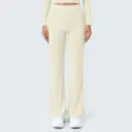 Detail shot of high-waisted flare yoga pants with contrast stitching for women activewear. - Oat Apricot