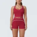 Detail view of the contrast piping yoga crop top and athletic shorts set in red. - S / Top And Bottom / Cherry Red