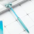 Blue crystal bow ballpoint pen with glitter liquid and cute design for daily gift use. - Blue