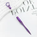 Portable purple metal letter opener and paper cutter with keychain and decorative bead design. - Deep purple