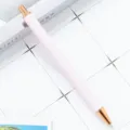 Pink glitter ballpoint pen with rose gold trim, stylish press stationery for office use. - Painted Pink