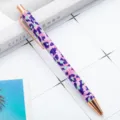 Stylish retractable ballpoint pen with trendy camouflage pattern, rose gold clip and tip. - Large Leopard Print Purple