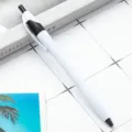 White retractable ballpoint pen with black clip, slim minimalist design for office school. - Black