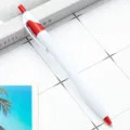 Slim plastic retractable ballpoint pen in white and red, perfect for office and promotional use. - Red