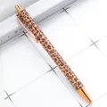 Stylish metal click ballpoint pen featuring a trendy leopard print pattern and rose gold trim. - Dark Brown New Leopard Print