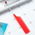 Red plastic tail comb with steel pin and bead end, professional salon and home hair styling tool. - Red
