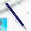 Dark blue metal retractable ballpoint pen, sleek design, smooth writing office stationery. - Transparent Blue (Silver Accents)