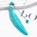 Marcador de páginas de pluma de metal turquesa, elegante accesorio para lectura. - Verde azulado