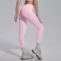Pink seamless high-waist fitness yoga leggings, stretchy breathable activewear pants variant. - Sakura Pink