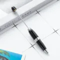 Creative DIY beadable ballpoint pen with sleek black metal body and top rod for custom beads. - Black