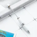 White metal beadable ballpoint pen with rotating mechanism for DIY craft art projects. - White