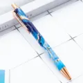 Metal retractable ballpoint pen with blue marble pattern and rose gold trim, elegant office stationery. - Hot Stamping Dark Blue Marble Pattern
