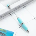 Μεταλλικό στυλό διαρκείας DIY σε χρώμα καραμέλας δημιουργικό περιστρεφόμενο στυλό γραφής - Μπλε Καραμέλα