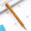 Retractable ballpoint pen with matte yellow barrel and rose gold metal trim for office stationery. - Frosted Coffee