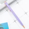Metal ballpoint pen in light purple with rose gold accents, elegant office stationery. - Candy Purple