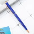 Metal ballpoint pen in blue with rose gold trim, elegant business gift pen for office use. - Transparent Blue