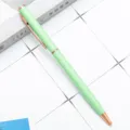 Light green metal ballpoint pen with rose gold trim, elegant office stationery item. - Candy Green