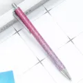 Pink glitter retractable ballpoint pen with silver metal clip for office and school use. - Rose Purple Gradient