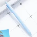 Light blue retractable ballpoint pen with soft-touch rubberized finish for smooth writing. - Sky Blue