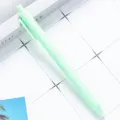 Light green retractable ballpoint pen, cute candy color plastic press pen for student writing. - Mint Green