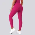 Detail view of high-waist butt-lifting yoga leggings in vibrant magenta color. - S / Bottoms / Wild Berry