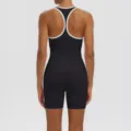 Detail view showing the breathable racerback design and fit of the black athletic top. - S / Top And Bottom / Black Body White Edge Tank + Black Shorts