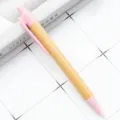 Eco-friendly bamboo ballpoint pen with pink accents, smooth writing office stationery gift. - Pink